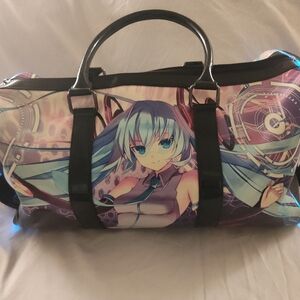 DOLLS KILL X HATSUNE MIKU DUFFLE BAG / WEEKENDER
